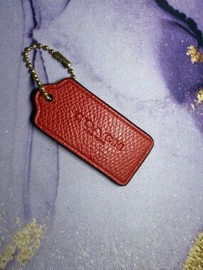 COACH Red Pebbled Leather Bag Tag with Gold Ball Chain Accent